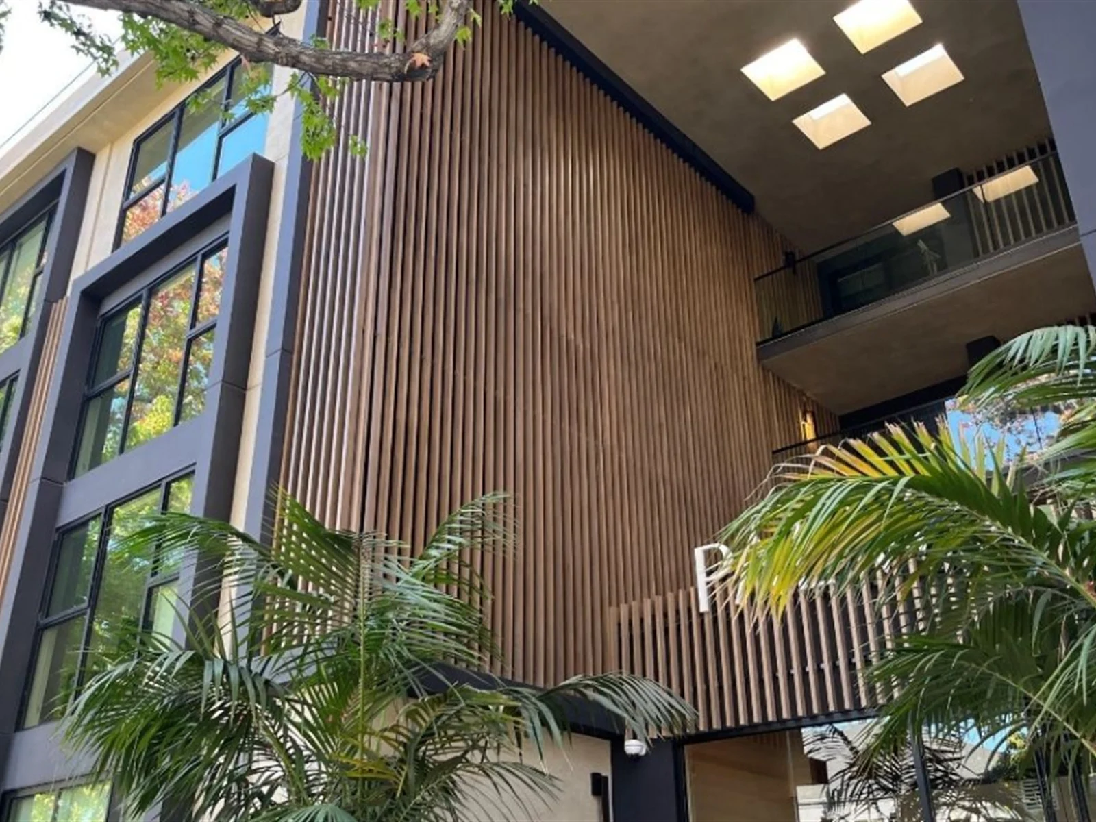 NOVANO vertical wood-look architectural facade